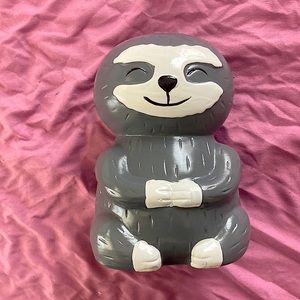 It’s a sloth bank for you or your kids to learn where to put their money